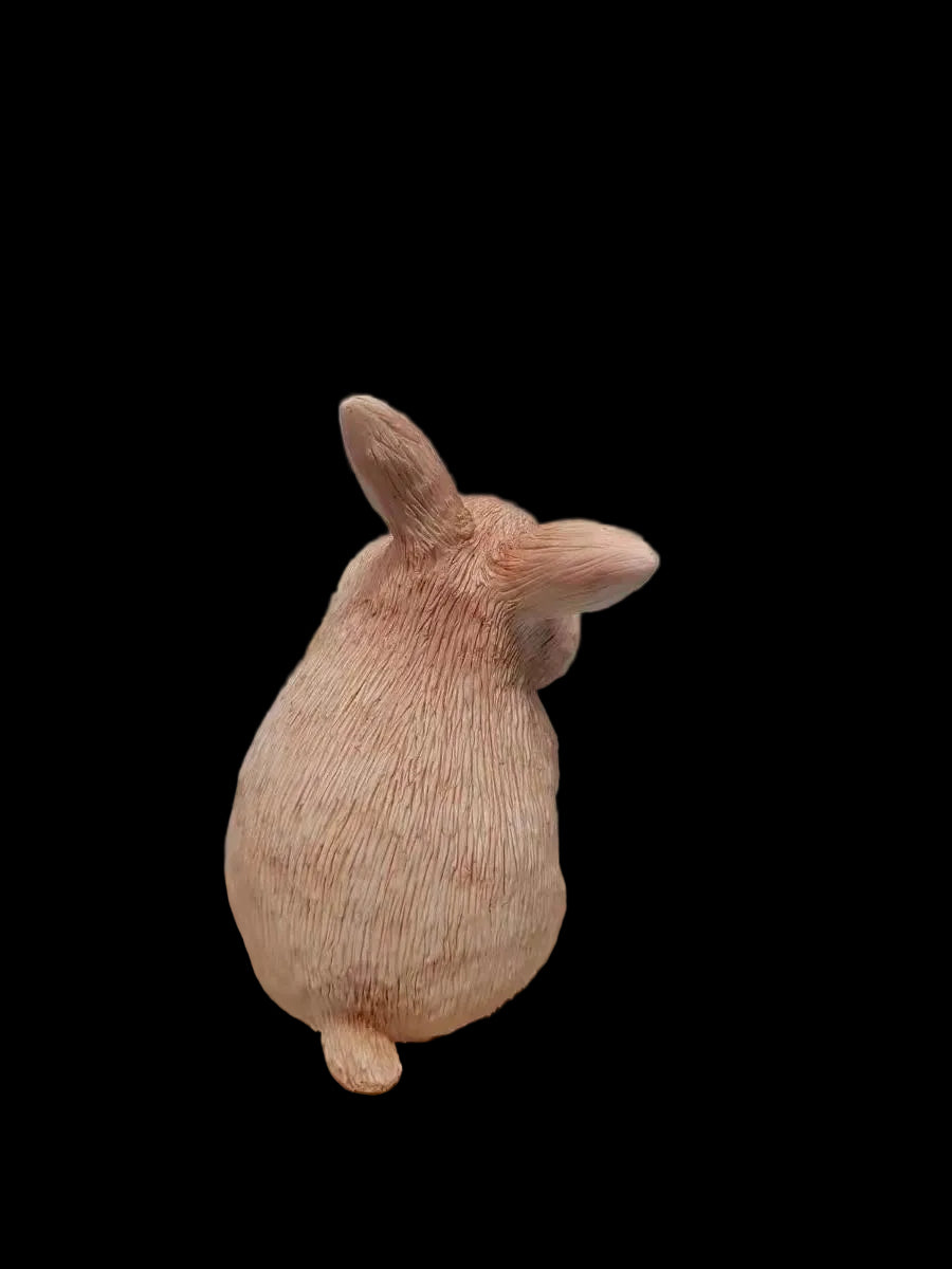 Back view showing the sculpted fur and ears of a custom rabbit figurine